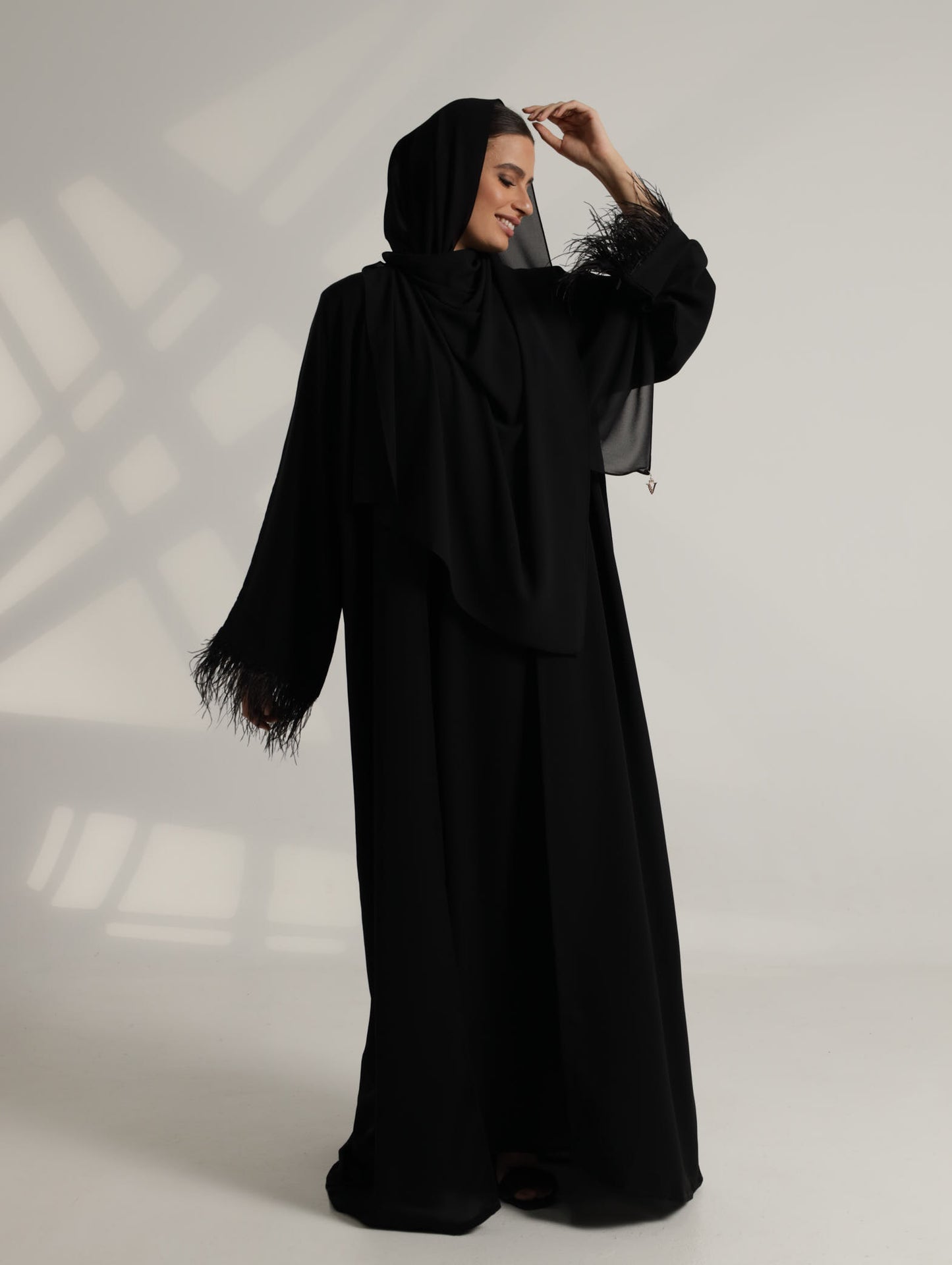 Yara black feather abaya